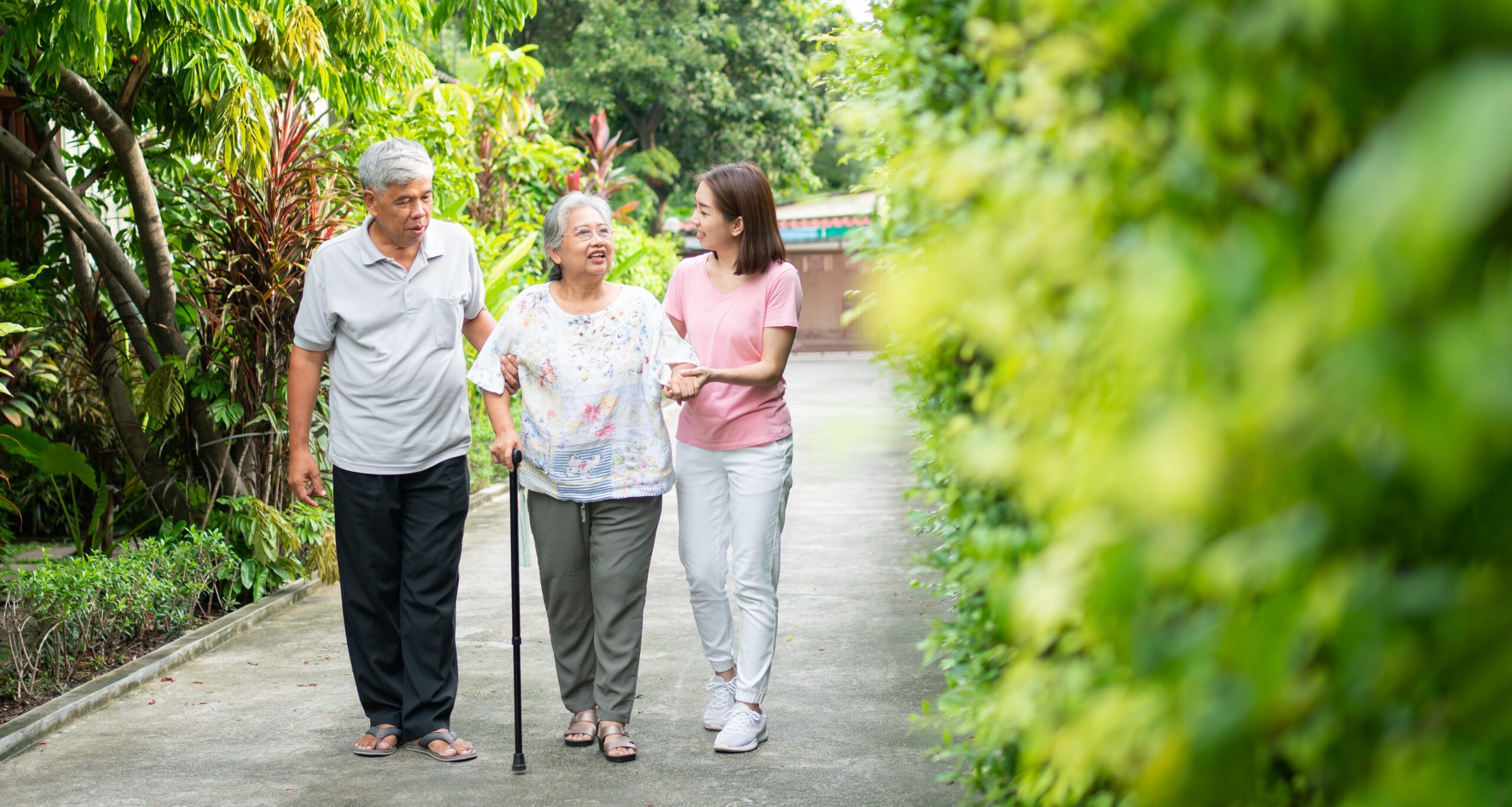 Happy,Family,Walking,Together,In,The,Garden.,Old,Elderly,Using Bringing Companionship to Isolated Seniors
